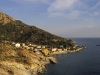 Die untergehende Sonne bringt die Farben der Westküste Elbas zum Leuchten, Elba, Toskana, Italien