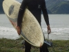 Surfer bei Kaikoura, Südinsel, Neuseeland